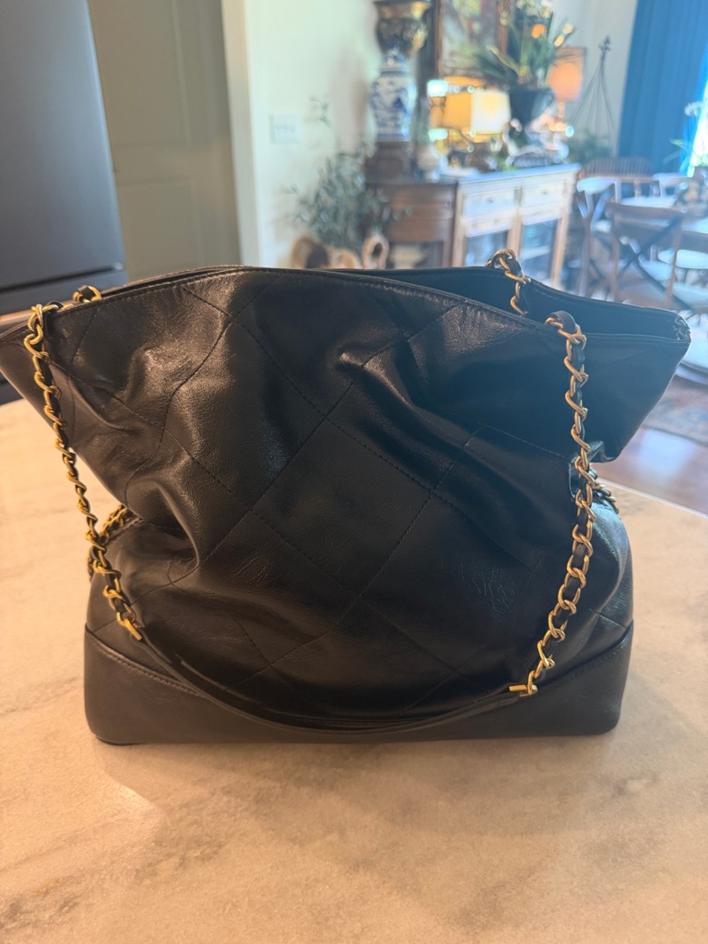 Elegant Black Quilted Shoulder Bag with Gold Chain Straps